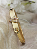 Gold-Plated Geometric Shaped White & Red Cubic Zirconia Stone studded Bracelet