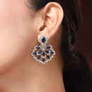 Rhodium Plated Silver Toned Petal Cluster Blue & White American Diamond Studded Earrings