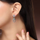 Rhodium Plated Silver Toned Floral Leaf Shaped Sea Green & White American Diamond Studded Drop Earrings