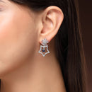 Rhodium Plated Silver Toned Starry Floral Shaped Navy Blue & White American Diamond Studded Drop Earrings