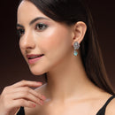 Rhodium Plated Silver Toned Leaf Shaped White And Sea Green American Diamond Studded Drop Earrings