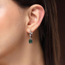 Rhodium Plated Silver Toned Oval Shaped Green American Diamond Studded Hoop Earrings