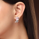 Rhodium Plated Silver Toned Floral Shaped Pink & White American Diamond Studded Stud Earrings