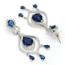 Rhodium Plated Silver Toned Teardrop Shaped Blue & White American Diamond Studded Earrings
