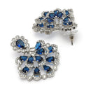 Rhodium Plated Silver Toned Petal Cluster Blue & White American Diamond Studded Earrings