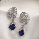Rhodium Plated Silver Toned Leaf Shaped Navy Blue White American Diamond Studded Drop Earrings