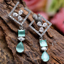 Rhodium-Plated Sea Green & White American Diamond studded Square & Teardrop Shaped Contemporary Drop Earrings