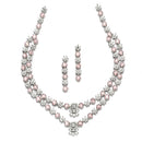 Rhodium-Plated Pink American Diamond Studded Star Shaped Layered Necklace & Earrings Jewellery Set