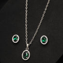 Rhodium Plated with Oval Shaped Green American Diamond Studded Pendant Set