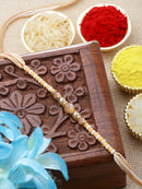 Traditional Gold Toned Beads Stringed Rakhi