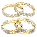 Set Of 4 Gold-Plated White American Diamond studded Dual Toned Paisley and Floral Design Bangles
