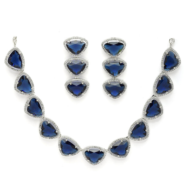 Rhodium Plated Silver Toned Blue Trillion Cut American Diamond Studded  Necklace With Matching Drop Earrings