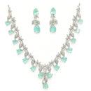 Rhodium Plated Silver Toned Leaf Teardrop Shaped Sea Green & White American Diamond Studded Jewellery Set