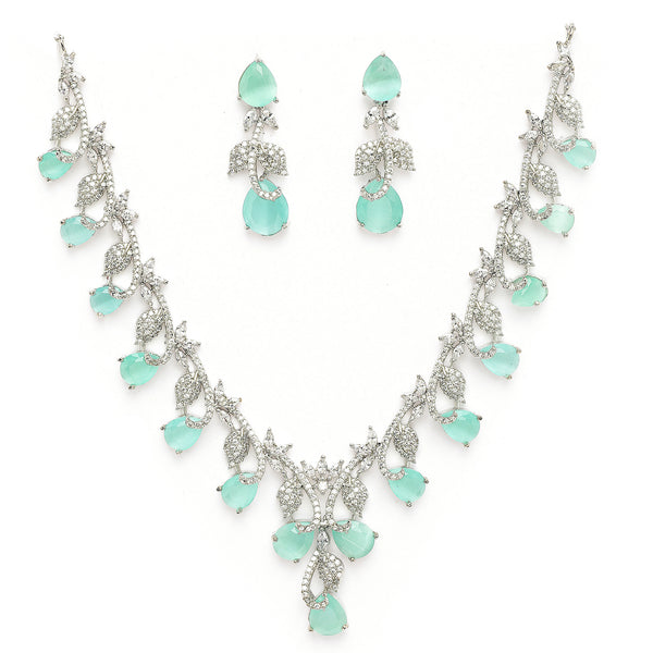 Rhodium Plated Silver Toned Leaf Teardrop Shaped Sea Green & White American Diamond Studded Jewellery Set