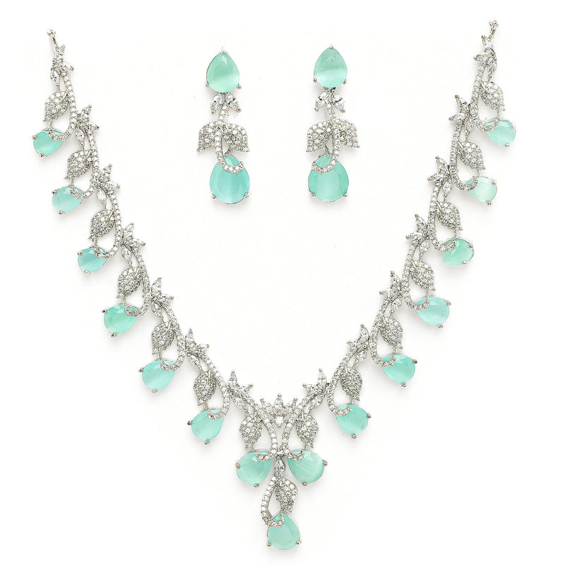 Rhodium Plated Silver Toned Leaf Teardrop Shaped Sea Green & White American Diamond Studded Jewellery Set
