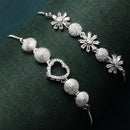 Rhodium Plated Silver Toned American Diamond Studded Halo Heart Charm & Floral Design Adjustable Bracelet Combo Set of 2