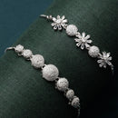 Rhodium Plated Silver Toned American Diamond Studded Floral Design & Round Charm Adjustable Bracelet Combo Set of 2