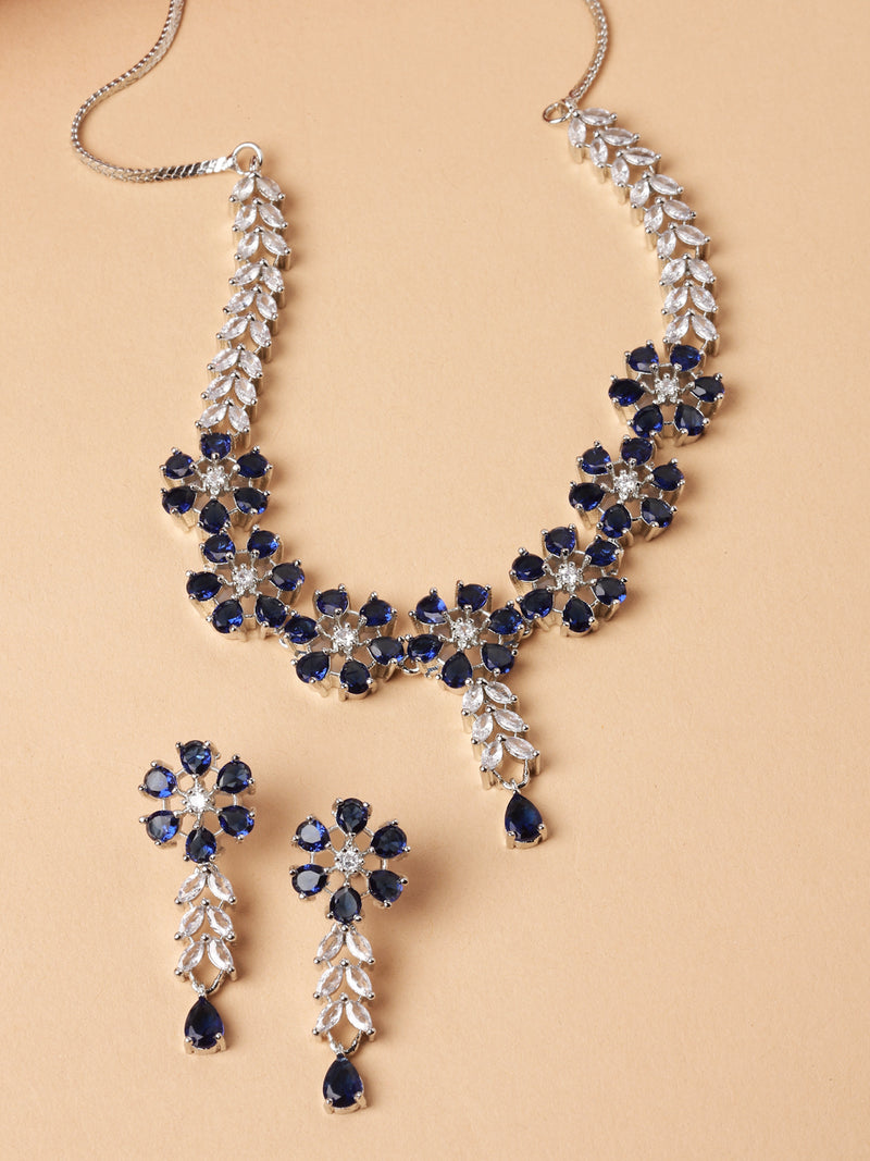 Rhodium-Plated Silver Toned Flower Navy Blue American Diamond Studded Necklace with Earrings Jewellery Set