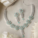 Rhodium-Plated Silver Tone Flower Sea Green American Diamond Studded Necklace with Earrings Jewellery Set