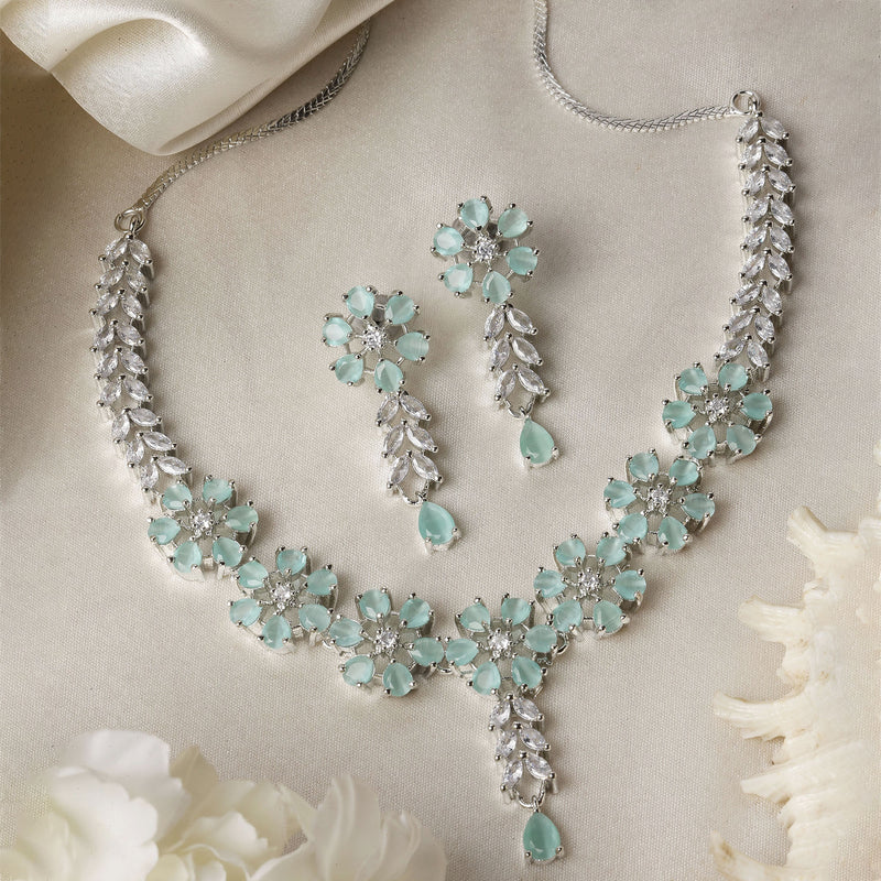 Rhodium-Plated Silver Tone Flower Sea Green American Diamond Studded Necklace with Earrings Jewellery Set