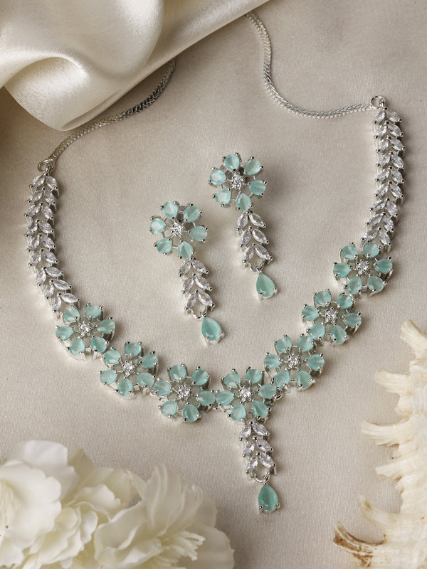 Rhodium-Plated Silver Tone Flower Sea Green American Diamond Studded Necklace with Earrings Jewellery Set