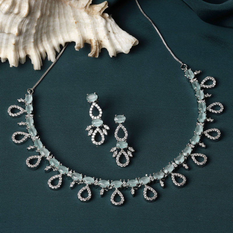Rhodium-Plated Silver Toned Sea Green American Diamond Studded Necklace with Earrings Jewellery Set