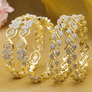 Set Of 4 Gold-Plated White American Diamond studded Dual Toned Paisley and Floral Design Bangles