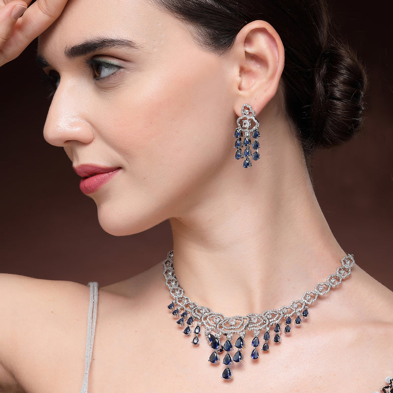 Rhodium Plated Silver Toned Floral Blue & White American Diamond Studded Jewellery Set