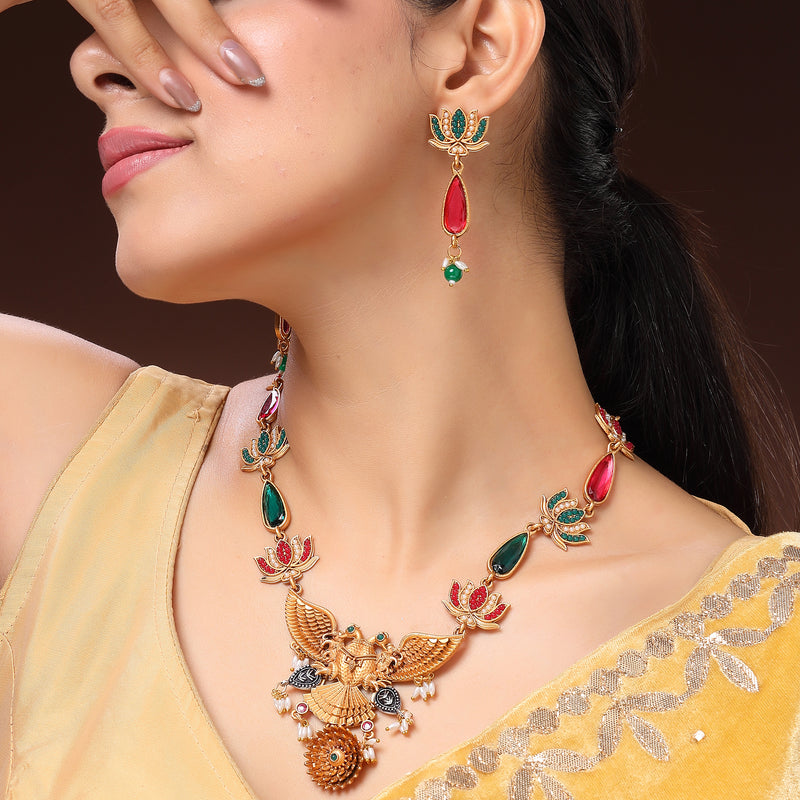 Traditional Gold Plated Lotus Shaped Pink & Blue Stone Studded & Pearl Beaded Jewellery Set