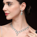 Rhodium Plated Silver Toned Leaf Teardrop Shaped Sea Green & White American Diamond Studded Jewellery Set