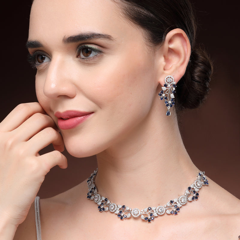 Rhodium Plated Silver Toned Leaf Shaped Blue & White American Diamond Studded Jewellery Set