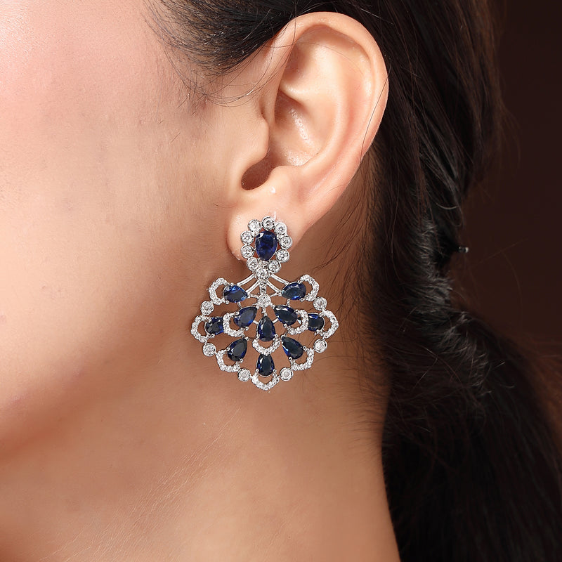 Rhodium Plated Silver Toned Petal Cluster Blue & White American Diamond Studded Earrings