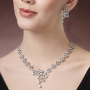 Rhodium Plated Silver Toned Floral Motif White AD Studded Necklace Set With Earrings