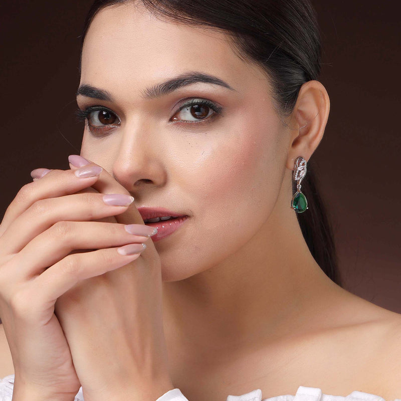 Rhodium Plated Silver Toned Teardrop Shaped Green & White American Diamond Studded Drop Earrings