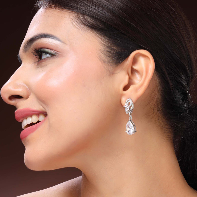 Rhodium Plated Silver Toned Teardrop Shaped White American Diamond Studded Drop Earrings