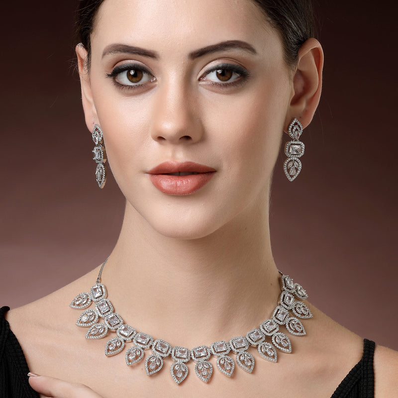 Rhodium Plated Silver Toned Halo Teardrop Design With White Square American Diamond Studded  Necklace With Matching Drop Earrings