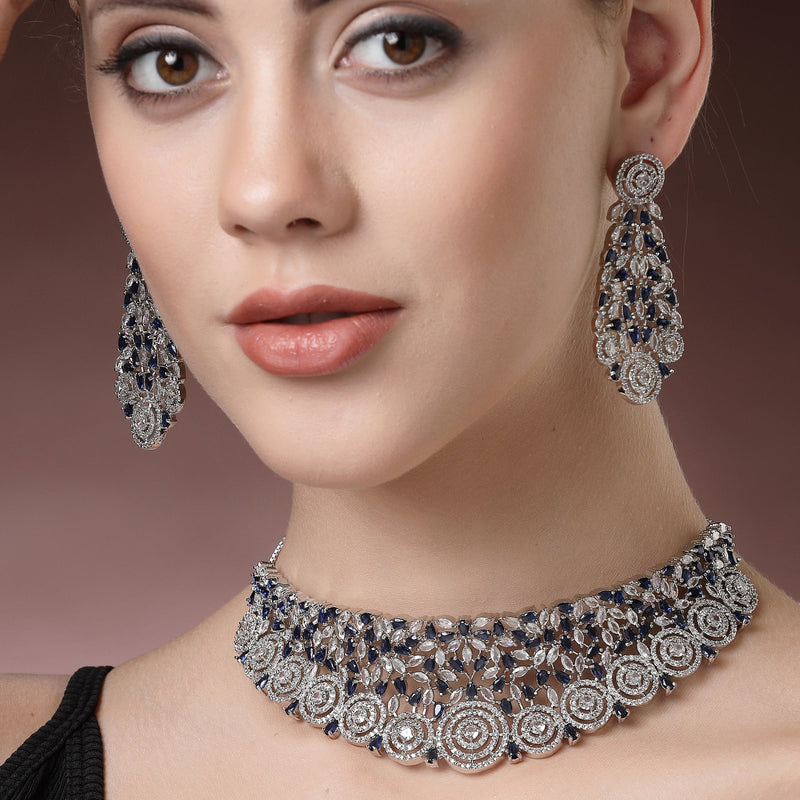 Rhodium Plated Silver Toned Round Design Blue  AD Studded Choker Necklace Set With Drop Earrings