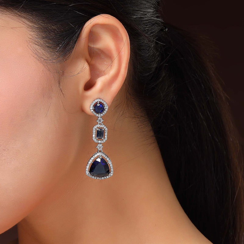 Rhodium Plated Silver Toned Geometric Shaped Navy Blue & White American Diamond Studded Drop Earrings