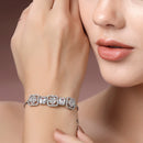 Rhodium Plated Silver Toned White Round & Rectangle American Diamond Studded Wraparound Adjustable Bracelet