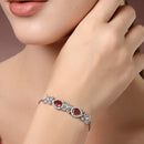 Rhodium Plated Silver Toned White Flower & Red Teardrop AD Studded Wraparound Adjustable Bracelet