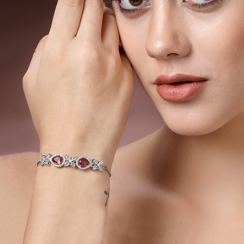 Rhodium Plated Silver Toned White Flower & Red Teardrop AD Studded Wraparound Adjustable Bracelet