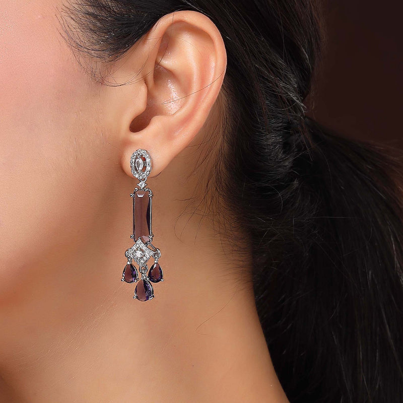 Rhodium Plated Silver Toned Bar Shaped Purple & White American Diamond Studded Earrings