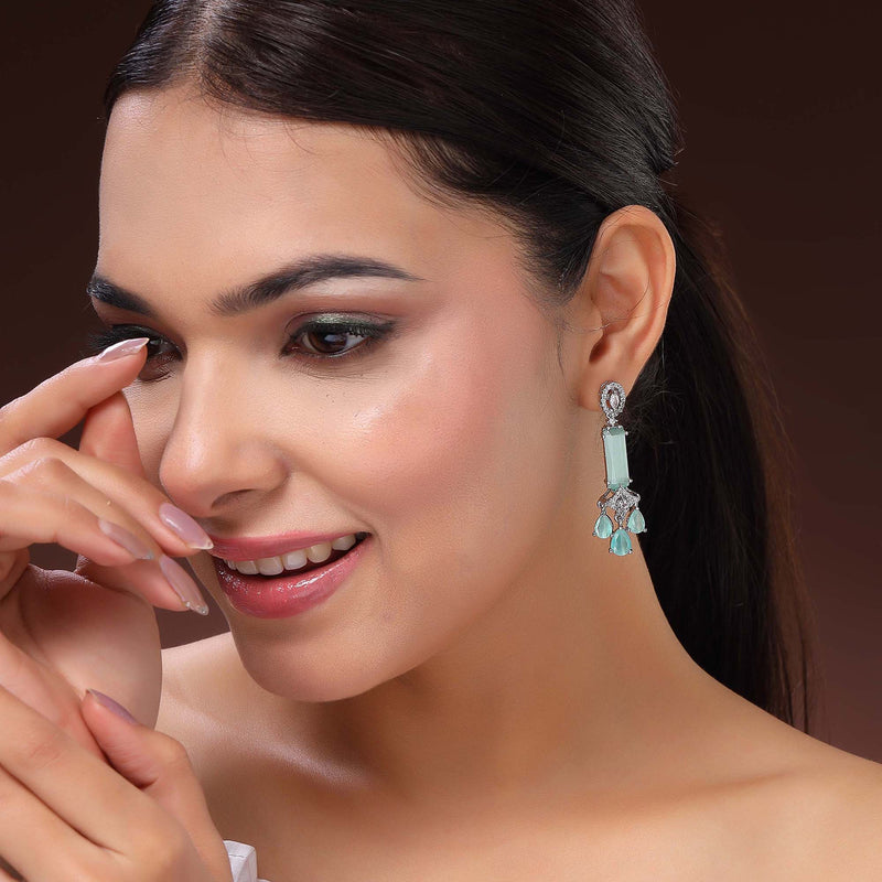 Rhodium Plated Silver Toned Bar Shaped Sea Green & White American Diamond Studded Earrings