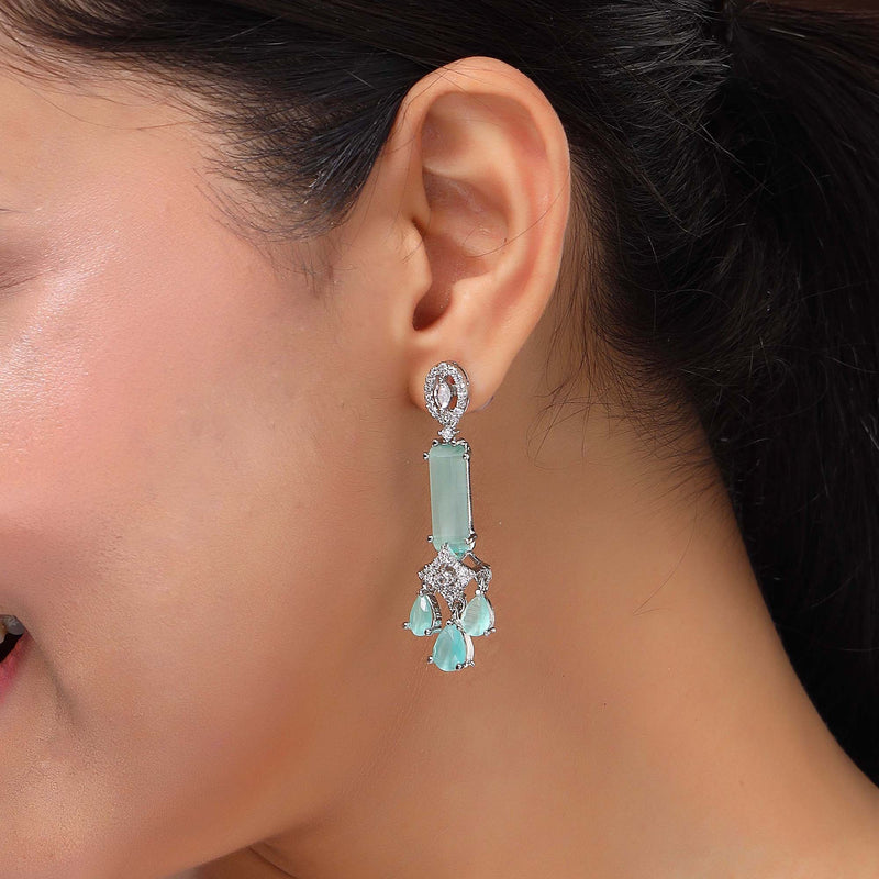 Rhodium Plated Silver Toned Bar Shaped Sea Green & White American Diamond Studded Earrings