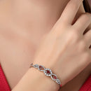 Rhodium Plated Silver Toned Oval & Teardrop Red American Diamond Studded Cuff Bracelet