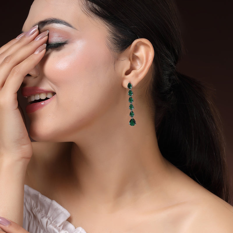 Rhodium Plated Silver Toned Teardrop Shaped Green American Diamond Studded Linear Dangler Earrings