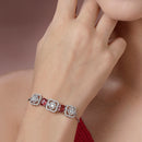 Rhodium Plated Silver Toned White Round & Red Rectangle American Diamond Studded Wraparound Adjustable Bracelet