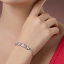 Rhodium Plated Silver Toned White Round & Pink Square Cut AD  Studded  Wraparound Adjustable Bracelet