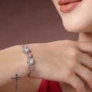 Rhodium Plated Silver Toned White Round & Pink Oval American Diamond Studded Wraparound Adjustable Bracelet