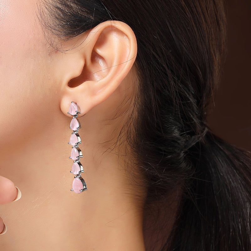 Rhodium Plated Silver Toned Teardrop Shaped Pink American Diamond Studded Linear Dangler Earrings
